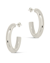 Load image into Gallery viewer, Rory Polished Tube Hoop Earrings
